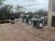 Community grilling area with multiple grills for resident use at 900 E Marion Ave # 1403, Punta Gorda, FL 33950