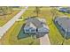 Aerial view of a house on a corner lot in a residential area at 16031 Alcira Cir, Punta Gorda, FL 33955