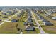 Aerial view of a house with a pool in a residential area at 16031 Alcira Cir, Punta Gorda, FL 33955