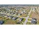 Aerial view of a house with a pool in a residential neighborhood at 16031 Alcira Cir, Punta Gorda, FL 33955