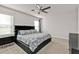 Spacious bedroom with king-size bed and ceiling fan at 16031 Alcira Cir, Punta Gorda, FL 33955