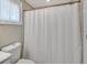 Clean bathroom with a tub, shower, and white tile at 2321 Sofia Ln, Punta Gorda, FL 33983