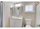 Well-lit bathroom featuring a new vanity, mirror, and marble countertop at 2321 Sofia Ln, Punta Gorda, FL 33983