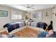 Nautical-themed bedroom featuring two twin beds and wood flooring at 2321 Sofia Ln, Punta Gorda, FL 33983