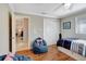 Comfortable bedroom with hardwood floors, beanbag chair and closet at 2321 Sofia Ln, Punta Gorda, FL 33983