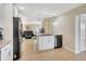 Bright kitchen with granite countertops and modern appliances flows into the living area at 2321 Sofia Ln, Punta Gorda, FL 33983