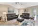 Spacious living room with tile floors, recliners and fan at 2321 Sofia Ln, Punta Gorda, FL 33983