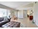 Comfortable living room area featuring tile floors, large windows, and elegant doors at 2321 Sofia Ln, Punta Gorda, FL 33983