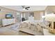 Spacious main bedroom suite featuring plantation shutters, ceiling fan and tiled floors at 2321 Sofia Ln, Punta Gorda, FL 33983