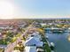 Aerial view of waterfront home with canal access and private dock at 2750 W Marion Ave, Punta Gorda, FL 33950