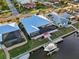 Aerial view of home with pool and boat dock at 2750 W Marion Ave, Punta Gorda, FL 33950