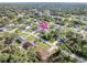 Aerial view of a single-Gathering home in a residential area at 3362 Rogue St, North Port, FL 34291