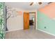 Bedroom with wood flooring and access to another room at 3362 Rogue St, North Port, FL 34291