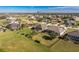 Aerial view showcasing the home's large backyard and surrounding neighborhood at 386 Royal Poinciana, Punta Gorda, FL 33955