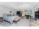 Spacious bedroom with a comfortable bed, ample storage, and a work area at 386 Royal Poinciana, Punta Gorda, FL 33955