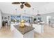 Spacious kitchen with island, granite countertops and stainless steel appliances at 386 Royal Poinciana, Punta Gorda, FL 33955