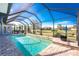 Inviting screened pool with patio at 386 Royal Poinciana, Punta Gorda, FL 33955