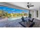 Relaxing pool area with screened enclosure, patio furniture, and view of lush landscaping at 386 Royal Poinciana, Punta Gorda, FL 33955