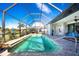 Relaxing screened-in pool area at 386 Royal Poinciana, Punta Gorda, FL 33955