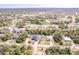 Wide aerial view showcasing home and surrounding neighborhood at 5188 Balmor Ter, North Port, FL 34288