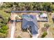 House with a fenced yard, pool, and detached shed at 5188 Balmor Ter, North Port, FL 34288