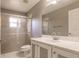 Clean bathroom, featuring a shower and white vanity at 5188 Balmor Ter, North Port, FL 34288