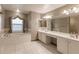 Double vanity bathroom with soaking tub and shower at 5188 Balmor Ter, North Port, FL 34288