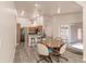 Casual dining area with a view of the kitchen and backyard at 5188 Balmor Ter, North Port, FL 34288