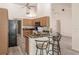 Kitchen with granite countertops and wood cabinets at 5188 Balmor Ter, North Port, FL 34288