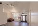 Living room features hardwood floors and a view of the front entryway at 5188 Balmor Ter, North Port, FL 34288