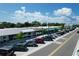 Aerial view of shops and businesses along a street at 700 W Perry St, Englewood, FL 34223