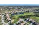 Aerial view of community and surrounding landscape at 8382 Creekview Ln, Englewood, FL 34224