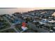 Wide aerial view showcasing the property and surrounding neighborhood at 174 Severin Se Rd, Port Charlotte, FL 33952