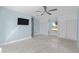 Bedroom with light blue walls and built-in closet at 174 Severin Se Rd, Port Charlotte, FL 33952