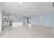 Modern kitchen with white cabinets and stainless steel appliances at 174 Severin Se Rd, Port Charlotte, FL 33952