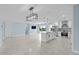 Remodeled kitchen featuring island, stainless steel appliances, and light blue walls at 174 Severin Se Rd, Port Charlotte, FL 33952