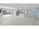 Open concept living room and kitchen with modern finishes at 174 Severin Se Rd, Port Charlotte, FL 33952