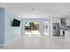 Living room with pool view and sliding glass doors at 174 Severin Se Rd, Port Charlotte, FL 33952