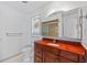 Bathroom features a large vanity and stained glass window at 1120 La Palma Ct, Punta Gorda, FL 33950