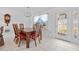 Bright dining room with table and four chairs at 1120 La Palma Ct, Punta Gorda, FL 33950