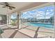 Covered patio overlooking the pool and canal at 1120 La Palma Ct, Punta Gorda, FL 33950