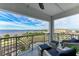 Serene balcony boasting water views and comfy seating at 1425 Park Beach Cir # 149, Punta Gorda, FL 33950