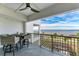 Relaxing balcony with water view and patio furniture at 1425 Park Beach Cir # 149, Punta Gorda, FL 33950