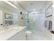 Modern bathroom with marble shower and vanity at 1425 Park Beach Cir # 149, Punta Gorda, FL 33950