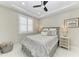 Guest bedroom with a queen-sized bed and window seating at 1425 Park Beach Cir # 149, Punta Gorda, FL 33950