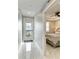 Elegant hallway with marble floors leading to bedroom at 1425 Park Beach Cir # 149, Punta Gorda, FL 33950