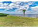 Scenic waterfront view with a peaceful bench at 1425 Park Beach Cir # 149, Punta Gorda, FL 33950