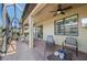 Screened patio with brick pavers and outdoor furniture at 2427 Daisy Dr, North Port, FL 34289