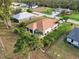 Aerial view of house, showing back and side yards at 25554 Prada Dr, Punta Gorda, FL 33955