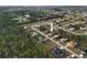 Aerial view of house and surrounding neighborhood at 25554 Prada Dr, Punta Gorda, FL 33955